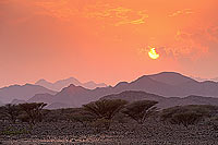 Khatmat Milahah plains, Hajar mountains at sunset, OMAN  (OM10241)